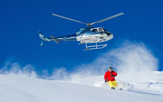 Glide-down-the-snow-capped-mountains--Heli-Skiing